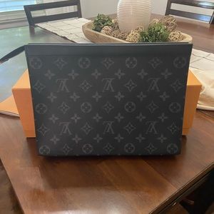 Black and gray Louis Vuitton clutch